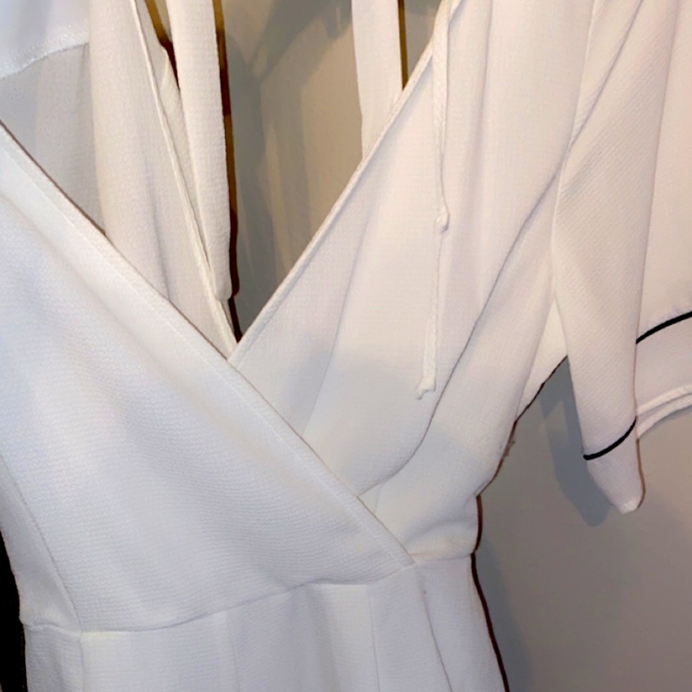 Hey guys this is a white dress and your back shows